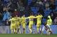 Villarreal's players celebrate after scoring a goal during the Spanish league football match between Real Madrid and Villarreal at the Santiago Bernabeu Stadium in Madrid on January 13, 2018. / AFP PHOTO / GABRIEL BOUYS (Photo credit should read GABRIEL BOUYS/AFP/Getty Images)