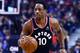 TORONTO, ON - JANUARY 13: DeMar DeRozan #10 of the Toronto Raptors dribbles the ball during the first half of an NBA game against the Golden State Warriors at Air Canada Centre on January 13, 2018 in Toronto, Canada. NOTE TO USER: User expressly acknowledges and agrees that, by downloading and or using this photograph, User is consenting to the terms and conditions of the Getty Images License Agreement. (Photo by Vaughn Ridley/Getty Images)