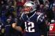 FOXBOROUGH, MA - JANUARY 13: Tom Brady #12 of the New England Patriots reacts after a touchdown in the third quarter of the AFC Divisional Playoff game against the Tennessee Titans at Gillette Stadium on January 13, 2018 in Foxborough, Massachusetts. (Photo by Jim Rogash/Getty Images)
