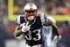 FOXBOROUGH, MA - JANUARY 13: Dion Lewis #33 of the New England Patriots carries the ball in the second quarter of the AFC Divisional Playoff game against the Tennessee Titans at Gillette Stadium on January 13, 2018 in Foxborough, Massachusetts. (Photo by Elsa/Getty Images)