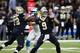 New Orleans Saints quarterback Drew Brees (9) passes in the first half of an NFL football game against the Carolina Panthers in New Orleans, Sunday, Jan. 7, 2018. (AP Photo/Butch Dill)