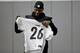 Pittsburgh Steelers running back Le'Veon Bell (26), holds his parctice jersey during an NFL football practice, Thursday, Jan. 11, 2018, in Pittsburgh. The Steelers host the Jacksonville Jaguars in a divisional playoff on Sunday. (AP Photo/Keith Srakocic)