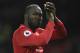 Manchester United's Belgian striker Romelu Lukaku applauds the fans at the end of the English Premier League football match between Manchester United and Stoke City at Old Trafford in Manchester, north west England, on January 15, 2018. / AFP PHOTO / Oli SCARFF / RESTRICTED TO EDITORIAL USE. No use with unauthorized audio, video, data, fixture lists, club/league logos or 'live' services. Online in-match use limited to 75 images, no video emulation. No use in betting, games or single club/league/player publications. / (Photo credit should read OLI SCARFF/AFP/Getty Images)