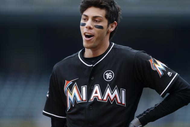 Miami Marlins' Christian Yelich reacts after a called third strike from Colorado Rockies starting pitcher Jon Gray in the first inning of a baseball game Wednesday, Sept. 27, 2017, in Denver. (AP Photo/David Zalubowski)