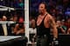 NEW YORK, NY - AUGUST 23: The Undertaker recovers during his fight against Brock Lesner at the WWE SummerSlam 2015 at Barclays Center of Brooklyn on August 23, 2015 in New York City. (Photo by JP Yim/Getty Images)