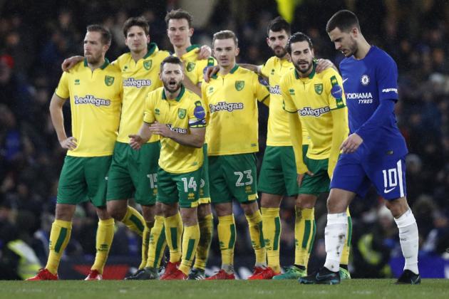 Chelsea's Belgian midfielder Eden Hazard walks to take his penalty during the FA Cup third round replay football match between Chelsea and Norwich City at Stamford Bridge in London on January 17, 2018. / AFP PHOTO / Adrian DENNIS / RESTRICTED TO EDITORIAL USE. No use with unauthorized audio, video, data, fixture lists, club/league logos or 'live' services. Online in-match use limited to 75 images, no video emulation. No use in betting, games or single club/league/player publications.  /         (Photo credit should read ADRIAN DENNIS/AFP/Getty Images)