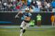 Carolina Panthers tight end Greg Olsen (88) runs with the ball against the Green Bay Packers during an NFL game in Charlotte, N.C. on Sunday, Dec. 17, 2017. (Chris Keane/AP Images for Panini)
