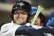 FILE - In April 6, 2017, file photo, Columbia Fireflies outfielder Tim Tebow smiles during a Class A minor league baseball game against the Augusta GreenJackets in Columbia, S.C. Tebow continues to grind in the minor league as he pursues his quest to play pro baseball at the highest level. After two months with the New York Mets Class A affiliate in Columbia, South Carolina, the former Heisman Trophy winner’s performance has been inconsistent and there remains no timetable for how long he will remain with the Fireflies.(AP Photo/Sean Rayford, File)