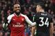 Arsenal's French striker Alexandre Lacazette (L) celebrates after scoring their fourth goal during the English Premier League football match between Arsenal and Crystal Palace at the Emirates Stadium in London on January 20, 2018. / AFP PHOTO / Ben STANSALL / RESTRICTED TO EDITORIAL USE. No use with unauthorized audio, video, data, fixture lists, club/league logos or 'live' services. Online in-match use limited to 75 images, no video emulation. No use in betting, games or single club/league/player publications. / (Photo credit should read BEN STANSALL/AFP/Getty Images)