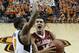 Oklahoma guard Trae Young (11) goes to the basket as Oklahoma State guard Tavarius Shine, left, defends, in the first half of an NCAA college basketball game in Stillwater, Okla., Saturday, Jan. 20, 2018. (AP Photo/Sue Ogrocki)