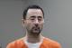 In this Nov. 22, 2017 file photo, Dr. Larry Nassar, 54, appears in court for a plea hearing in Lansing, Mich. Nasser, a sports doctor accused of molesting girls while working for USA Gymnastics and Michigan State University pleaded, guilty to multiple charges of sexual assault and will face at least 25 years in prison.(AP Photo/Paul Sancya)