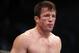 FILE - In this Aug. 17, 2013, file photo, Chael Sonnen looks on after his win against Mauricio 'Shogun' Rua, of Brazil, in their UFC mixed martial arts light heavyweight bout in Boston. Chael Sonnen is returning to mixed martial arts with the Bellator promotion, the veteran fighter tells The Associated Press. The 39-year-old Sonnen signed a multiyear, multi-fight deal with the UFC's largest competitor on Thursday night, Sept. 15, 2016. (AP Photo/Gregory Payan, File)