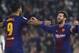 Barcelona's Messi, right, celebrates with teammate Suarez after scoring against Betis during the La Liga soccer match between Barcelona and Betis at the Villamarin stadium, in Seville, Spain on Sunday, Jan. 21, 2018. (AP Photo/Miguel Morenatti)