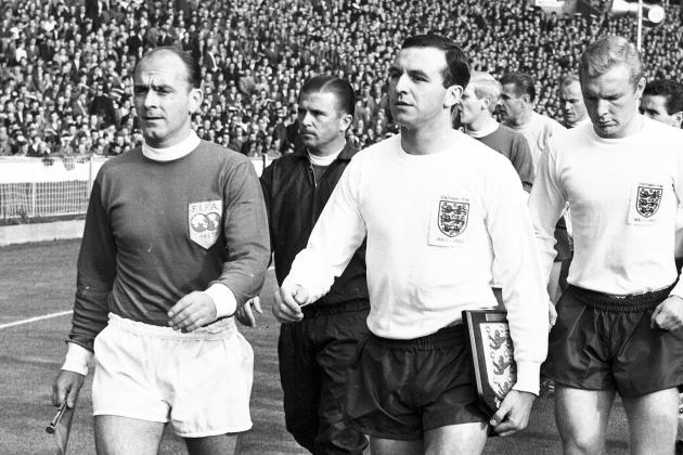 ** FILE ** Captain Alfredo Di Stefano, left, leads out the Rest of the World team and captain Jimmy Armfield leads out England, for the Football Association Centenary soccer match at Wembley Stadium, London, on in this Oct. 23, 1963 file photo. Behind Di Stefano is Ferenc Puskas and behind Armfield is Bobby Moore. England won the match 2 - 1. Hungarian soccer great Ferenc Puskas has died in a Budapest hospital. He was 79. Puskas died Friday, Nov. 17, 2006 at 7 a.m. (0600 GMT) at the Kutvolgyi hospital of respiratory and circulatory failure, family spokesman Gyorgy Szollosy said. The captain of Hungary's
