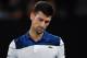 Serbia's Novak Djokovic reacts after a point against South Korea's Hyeon Chung during their men's singles fourth round match on day eight of the Australian Open tennis tournament in Melbourne on January 22, 2018. / AFP PHOTO / Paul Crock / -- IMAGE RESTRICTED TO EDITORIAL USE - STRICTLY NO COMMERCIAL USE -- (Photo credit should read PAUL CROCK/AFP/Getty Images)