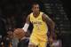 Los Angeles Lakers' Kentavious Caldwell-Pope dribbles the ball during the first half of an NBA basketball game against the San Antonio Spurs Thursday, Jan. 11, 2018, in Los Angeles. (AP Photo/Jae C. Hong)