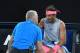Spain's Rafael Nadal receives medical attention during their men's singles quarter-finals match against Croatia's Marin Cilic on day nine of the Australian Open tennis tournament in Melbourne on January 23, 2018. / AFP PHOTO / WILLIAM WEST / -- IMAGE RESTRICTED TO EDITORIAL USE - STRICTLY NO COMMERCIAL USE -- (Photo credit should read WILLIAM WEST/AFP/Getty Images)