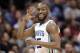 Charlotte Hornets' Kemba Walker (15) reacts to a teammate's basket against the Sacramento Kings during the second half of an NBA basketball game in Charlotte, N.C., Monday, Jan. 22, 2018. (AP Photo/Chuck Burton)