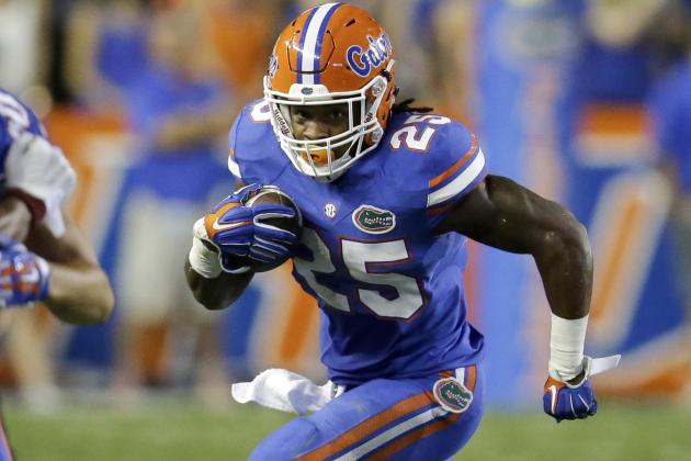 Florida running back Jordan Scarlett (25) gains yardage against New Mexico State during the second half of an NCAA college football game, Saturday, Sept. 5, 2015, in Gainesville, Fla. Florida won 61-13. (AP Photo/John Raoux)