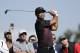 Tiger Woods watches his tee shot on the second hole hole of the South Course at Torrey Pines Golf Course during the first round of the Farmers Insurance Open golf tournament Thursday, Jan. 25, 2018, in San Diego. (AP Photo/Gregory Bull)