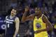 Golden State Warriors' Kevin Durant, right, celebrates a score as Minnesota Timberwolves' Nemanja Bjelica reacts during the first half of an NBA basketball game Thursday, Jan. 25, 2018, in Oakland, Calif. (AP Photo/Ben Margot)