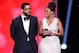 PASADENA, CA - JANUARY 15:  Michael Smith (L) and Jemele Hill speak onstage during the 49th NAACP Image Awards at Pasadena Civic Auditorium on January 15, 2018 in Pasadena, California.  (Photo by Maury Phillips/Getty Images for NAACP )