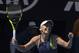 Denmark's Caroline Wozniacki celebrates after defeating Belgium's Elise Mertens after winning their semifinal at the Australian Open tennis championships in Melbourne, Australia, Thursday, Jan. 25, 2018. (AP Photo/Andy Brownbill)