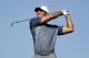 Tiger Woods watches his tee shot on the 15th hole on the North Course at Torrey Pines Golf Course during the second round of Farmers Insurance Open golf tournament Friday, Jan. 26, 2018, in San Diego. (AP Photo/Gregory Bull)
