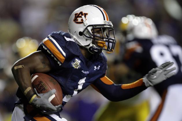 Auburn running back Brad Lester heads upfield in the first half of a football game against LSU in Baton Rouge, La., Saturday, Oct. 20, 2007. (AP Photo/Alex Brandon)