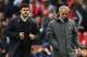 Tottenham Hotspur's Argentinian head coach Mauricio Pochettino (L) and Manchester United's Portuguese manager Jose Mourinho (R) walk off at half time in the English Premier League football match between Manchester United and Tottenham Hotspur at Old Trafford in Manchester, north west England, on October 28, 2017. / AFP PHOTO / Oli SCARFF / RESTRICTED TO EDITORIAL USE. No use with unauthorized audio, video, data, fixture lists, club/league logos or 'live' services. Online in-match use limited to 75 images, no video emulation. No use in betting, games or single club/league/player publications. / (Photo credit should read OLI SCARFF/AFP/Getty Images)