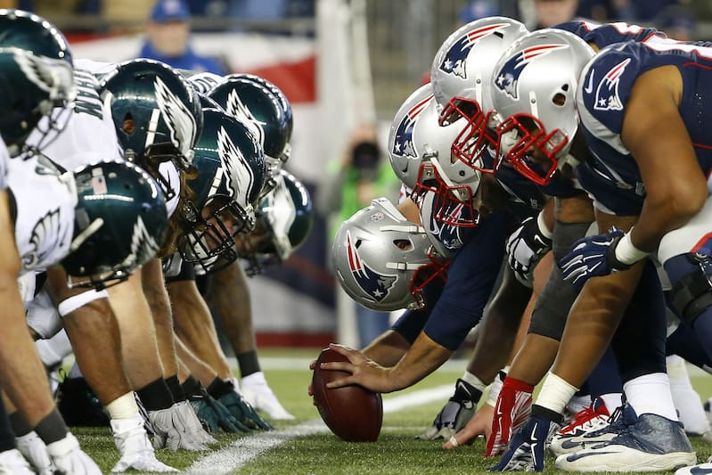 The Patriots line up on Offense across from the Eagles defensive line.