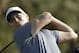 Alex Noren, of Sweden, watches his tee shot on the 14th hole of the South Course at Torrey Pines Golf Course during the third round of the Farmers Insurance Open golf tournament, Saturday, Jan. 27, 2018, in San Diego. (AP Photo/Gregory Bull)