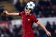 Roma's Edin Dzeko heads the ball during the group C Champions League soccer match between Roma and Qarabag at the Stadio Olimpico in Rome, Italy, Tuesday, Dec. 5, 2017. (Angelo Carboni/ANSA via AP)