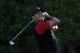 Tiger Woods watches his tee shot on the 11th hole of the South Course at Torrey Pines Golf Course during the final round of the Farmers Insurance Open golf tournament, Sunday, Jan. 28, 2018, in San Diego. (AP Photo/Gregory Bull)