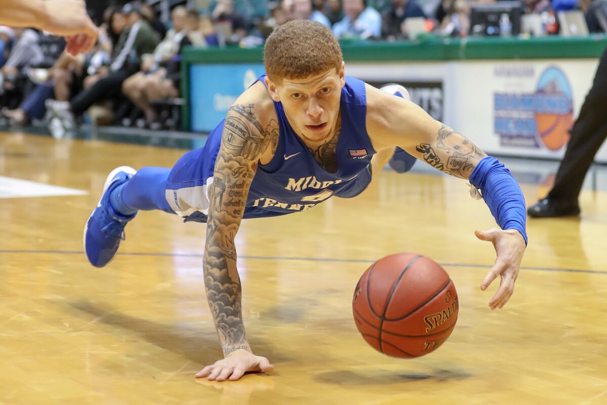 middle tennessee state s tyrik dixon crosses over opponent and