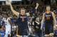 Virginia's Kyle Guy (5) and Jack Salt (33) walk off the court following a victory in an NCAA college basketball game against Duke in Durham, N.C., Saturday, Jan. 27, 2018. (AP Photo/Ben McKeown)