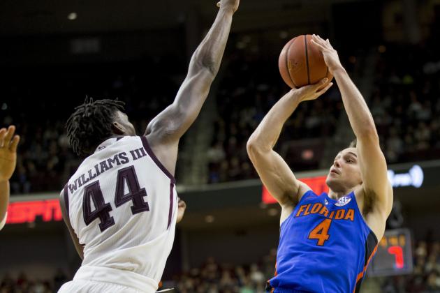 Florida guard Egor Koulechov (4) puts up a shot against Texas A&M forward Robert Williams (44) during the second half of an NCAA college basketball game Tuesday, Jan. 2, 2018, in College Station, Texas. Florida won, 83-66. (AP Photo/Sam Craft)