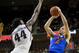 Florida guard Egor Koulechov (4) puts up a shot against Texas A&M forward Robert Williams (44) during the second half of an NCAA college basketball game Tuesday, Jan. 2, 2018, in College Station, Texas. Florida won, 83-66. (AP Photo/Sam Craft)