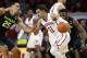 Oklahoma guard Trae Young (11) drives between Baylor forward Tristan Clark (25) and guard Tyson Jolly, right, during the first half of an NCAA college basketball game in Norman, Okla., Tuesday, Jan. 30, 2018. (AP Photo/Sue Ogrocki)
