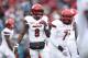 JACKSONVILLE, FL - DECEMBER 30: Lamar Jackson #8 of the Louisville Cardinals directs the offense against the Mississippi State Bulldogs during the TaxSlayer Bowl at EverBank Field on December 30, 2017 in Jacksonville, Florida. The Bulldogs won 31-27. (Photo by Joe Robbins/Getty Images)