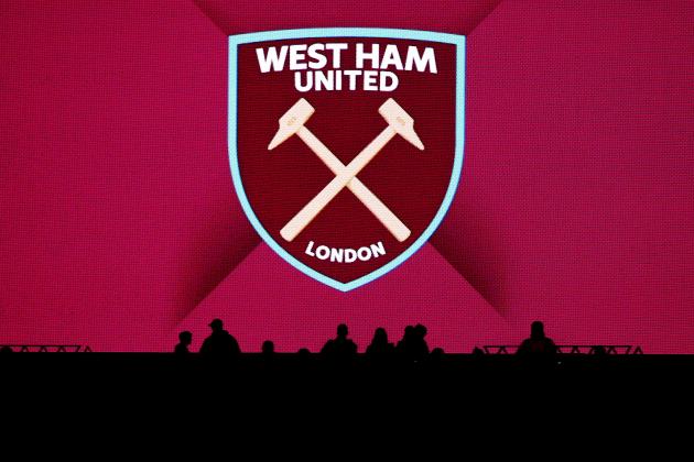 LONDON, ENGLAND - OCTOBER 20: Silhoutte of fans infront of the West Ham Badge during the Premier League match between West Ham United and Brighton and Hove Albion at London Stadium on October 20, 2017 in London, England. (Photo by Catherine Ivill - AMA/Getty Images)