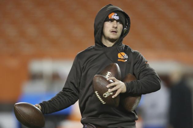 Cleveland Browns quarterback Johnny Manziel warms up before an NFL football game between the Baltimore Ravens and the Cleveland Browns, Monday, Nov. 30, 2015, in Cleveland. (AP Photo/Ron Schwane)
