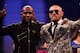 LAS VEGAS, NV - AUGUST 25: (L-R) Floyd Mayweather Jr. and Conor McGregor pose for pictures during a news conference after Mayweather's 10th-round TKO victory in their super welterweight boxing match on August 26, 2017 at T-Mobile Arena in Las Vegas, Nevada. (Photo by Jeff Bottari/Zuffa LLC/Zuffa LLC via Getty Images)