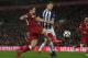 Liverpool's English striker Danny Ings (L) shoots under pressure from West Bromwich Albion's Northern Irish defender Jonny Evans during the English FA Cup fourth round football match between Liverpool and West Bromwich Albion at Anfield in Liverpool, north west England on January 27, 2018. / AFP PHOTO / PAUL ELLIS / RESTRICTED TO EDITORIAL USE. No use with unauthorized audio, video, data, fixture lists, club/league logos or 'live' services. Online in-match use limited to 75 images, no video emulation. No use in betting, games or single club/league/player publications. / (Photo credit should read PAUL ELLIS/AFP/Getty Images)