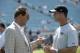 Baltimore Ravens owner Steve Bisciotti, left, chats with head coach John Harbaugh during warmups before an NFL football game against the Jacksonville Jaguars in Jacksonville, Fla., Sunday, Sept. 25, 2016. (AP Photo/Phelan M. Ebenhack)