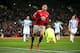 MANCHESTER, ENGLAND - FEBRUARY 03: Alexis Sanchez of Manchester United celebrates after scoring his sides second goal during the Premier League match between Manchester United and Huddersfield Town at Old Trafford on February 3, 2018 in Manchester, England. (Photo by Alex Morton/Getty Images)