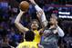 Los Angeles Lakers center Brook Lopez, top left, shoots in front of Oklahoma City Thunder center Steven Adams (12) in the first half of an NBA basketball game in Oklahoma City, Sunday, Feb. 4, 2018. (AP Photo/Sue Ogrocki)