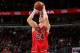 CHICAGO, IL - JANUARY 28: Lauri Markkanen #24 of the Chicago Bulls shoots the ball against the Milwaukee Bucks on January 28, 2018 at the United Center in Chicago, Illinois. NOTE TO USER: User expressly acknowledges and agrees that, by downloading and or using this Photograph, user is consenting to the terms and conditions of the Getty Images License Agreement. Mandatory Copyright Notice: Copyright 2018 NBAE (Photo by Gary Dineen/NBAE via Getty Images)