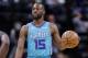 Charlotte Hornets guard Kemba Walker (15) brings the ball up court against the Indiana Pacers during the first half of an NBA basketball game in Indianapolis, Monday, Jan. 29, 2018. (AP Photo/Michael Conroy)