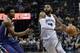 Memphis Grizzlies guard Tyreke Evans, right, drives against Phoenix Suns forward Josh Jackson in the first half of an NBA basketball game Monday, Jan. 29, 2018, in Memphis, Tenn. (AP Photo/Brandon Dill)